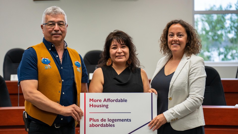 NWT MP Michael McLeod, territorial minister of Housing NWT and homelessness Paulie Chinna, and Yellowknife Mayor Rebecca Alty Friday's affordable housing annoucement. Photo: GNWT