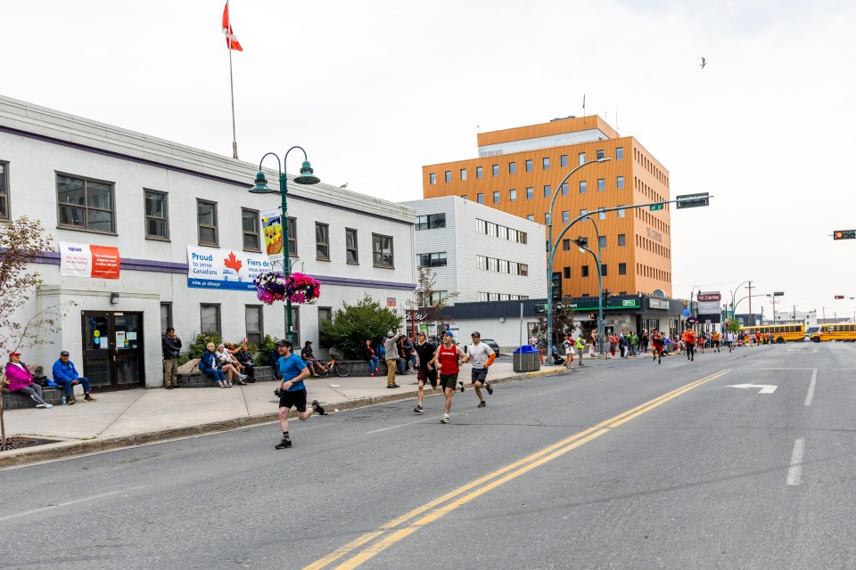 Runners start the Canada Day mile.
