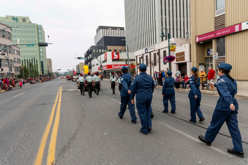 The parade heads down Yellowknife's main street.