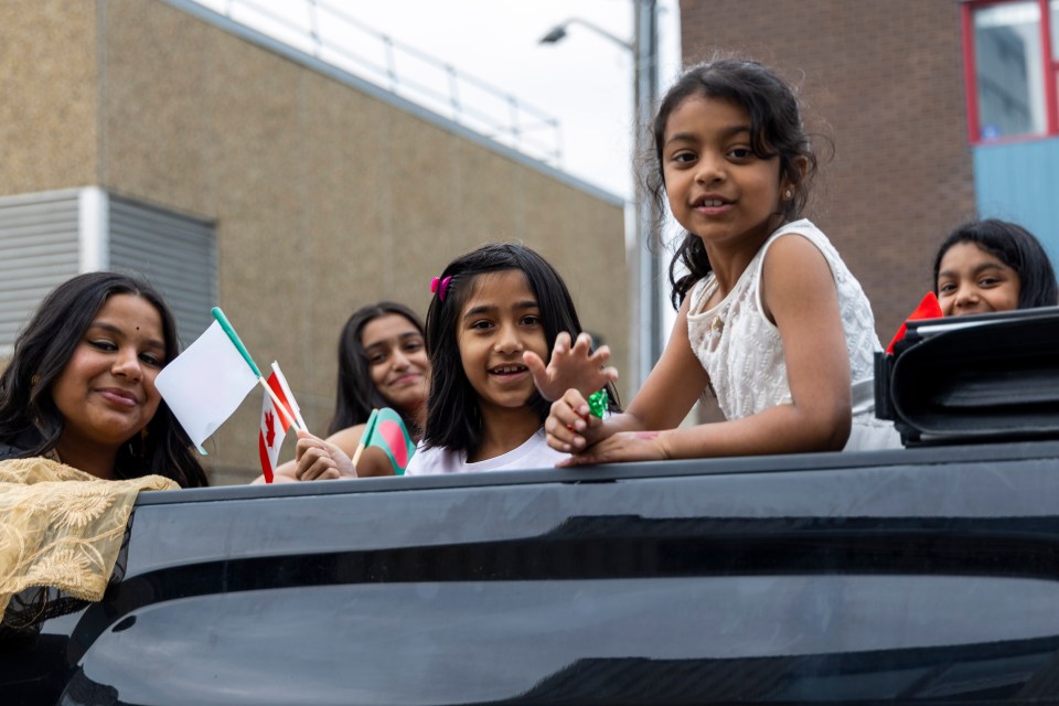 Children taking part in the Bangladeshi section of the parade.