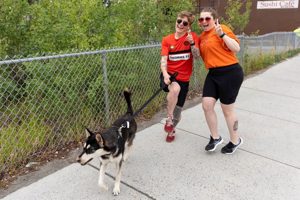 H Hayes and Sarah Sibley with Juni the dog.