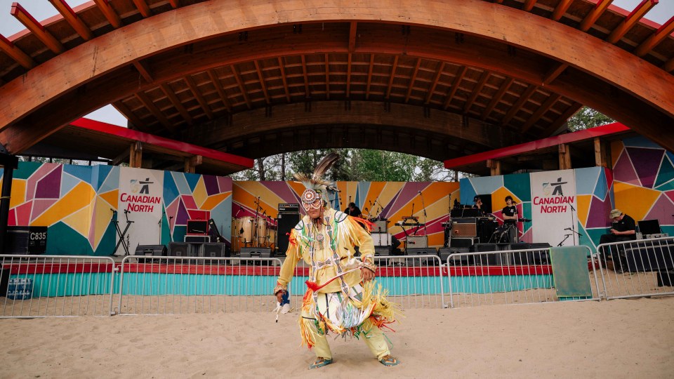 A member of the Northern Lights Pow Wow Dancers performs at the main stage. Sarah Pruys/Cabin Radio