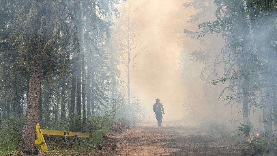 A firefighter working on the Fort Smith fire. Photo: Wood Buffalo National Park