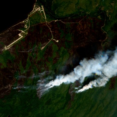 Fire smoke on the southern edge of Sambaa K'e is seen in a Sentinel-2 satellite image from July 1, 2023.