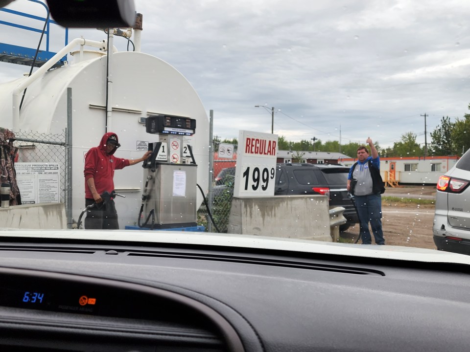 Gas attendants in Fort Providence. Photo: Jacqueline Mo 