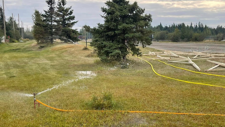 A sprinkler line between homes and Parker Park ball fields. Chris Greencorn/Facebook