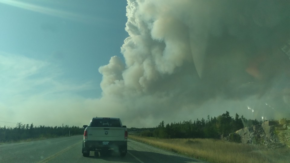Evacuating Yellowknife the evening of August 16, 2023. Photo Lara Mountain