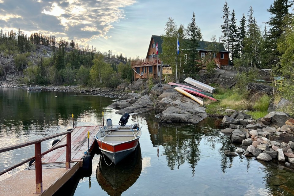 A calm evening at Yellow Dog Lodge, with a hint of burned forest in the background. Photo: Manjushree Thapa