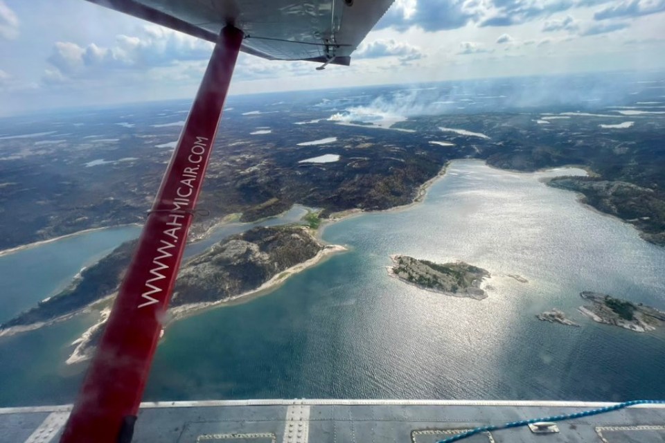 A view of a wildfire from an Ahmic Air aircraft. Photo: Manjushree Thapa