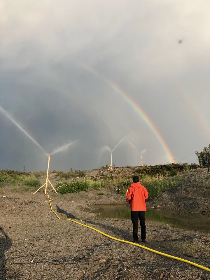 The rainbow shows off to some sprinkler systems. Photo: Pete Houweling