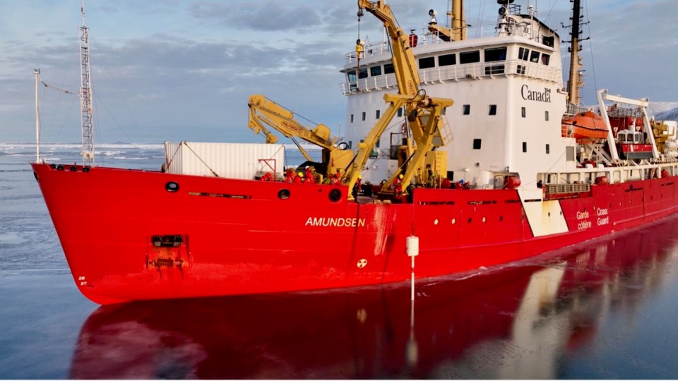 A gravity corer, which collects sediment from the sea floor, being deployed from the Amundsen. Photo: Amundsen Science