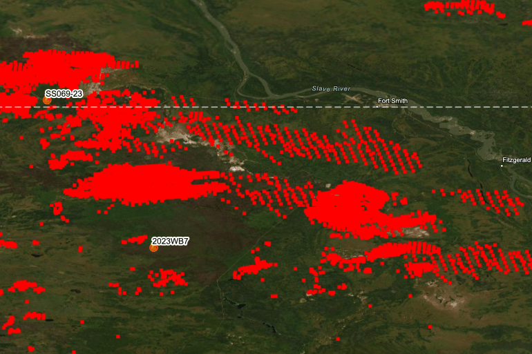 Hot-spots picked up by a satellite near Fort Smith are shown as red marks in this screengrab from 1:30am on Monday, August 14.
