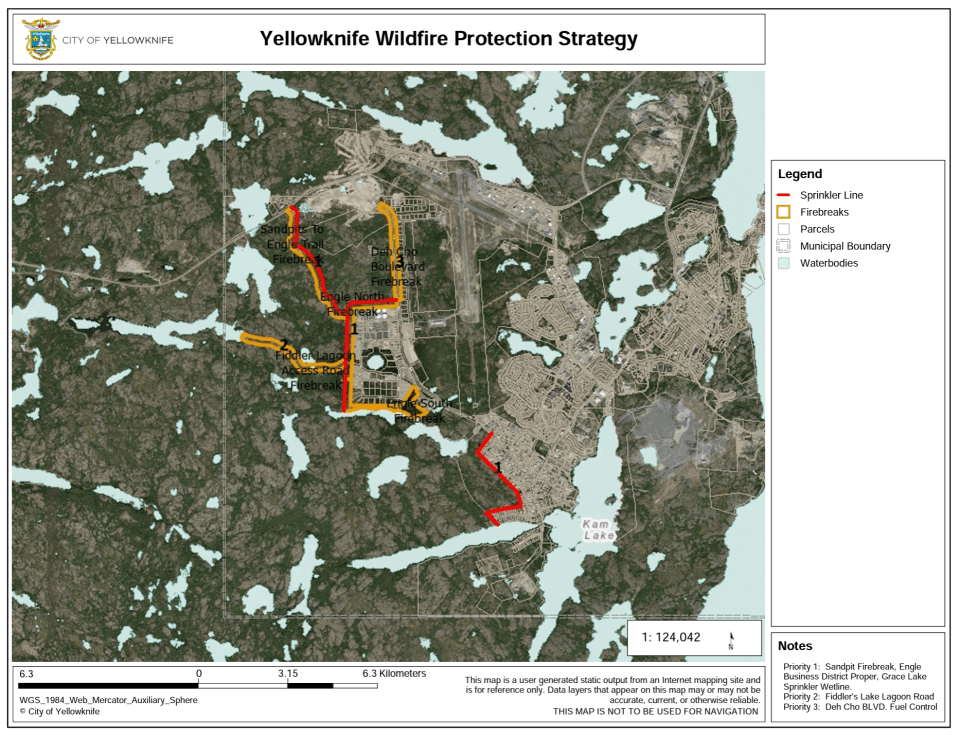 A map shared by the City of Yellowknife on Monday shows planned sprinkler setups, in red, and fire breaks in yellow.