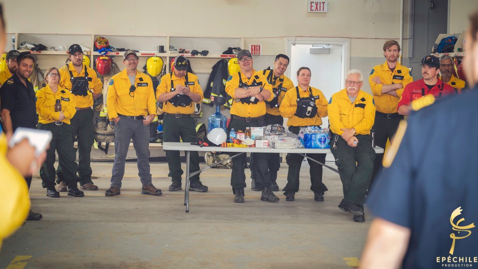 Firefighters listen to a briefing in Fort Smith. Epéchile Production/Facebook