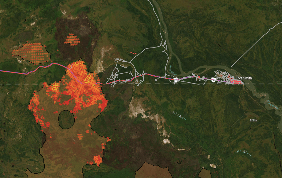 A map shows satellite hot-spots and burn area of a fire outside Fort Smith on August 12, 2023.
