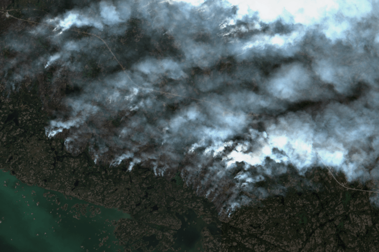 A wildfire burns west of Yellowknife in a Sentinel-2 satellite image on August 16, 2023.