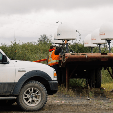 Northwestel technicians installing OneWeb low-Earth orbit dishes in Inuvik after a wildfire damaged a fibre line. Photo: Northwestel