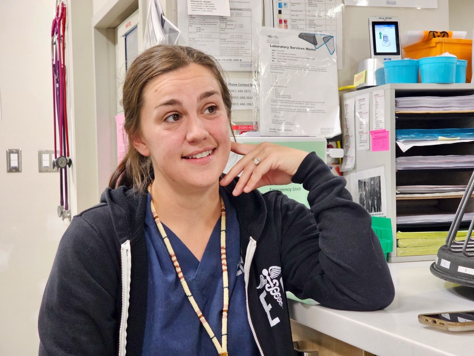 Shayna Kelly, a nurse, on the day after Yellowknife's evacuation order lifted. "We show up to our shifts and people trickle in, but the shoe is going to drop, because people are going to be back." Ollie Williams/Cabin Radio