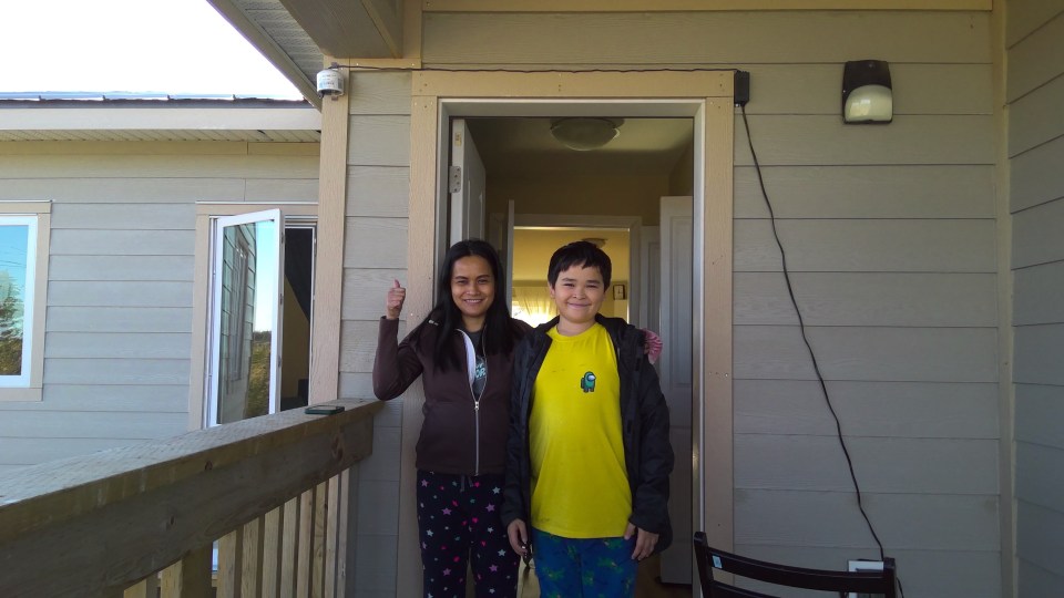Anna and Joseph Ignacio volunteered to host a PurpleAir sensor (upper left) at their teachers’ residence in Colville Lake. Colin Merz/GNWT