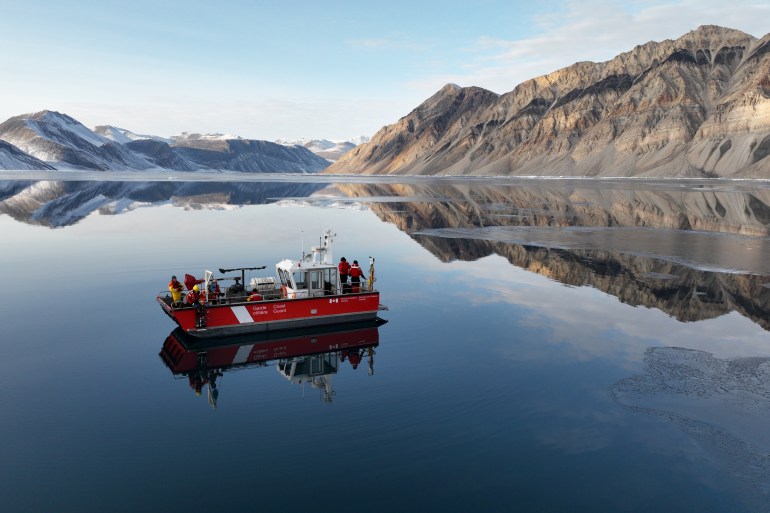 A barge off the CCGS Amundsen takes optical measurements in Archer Fjord, the northernmost fjord in Nares Strait. Photo: Amundsen Science
