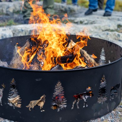 A fire in a Ndılǫ fire pit.