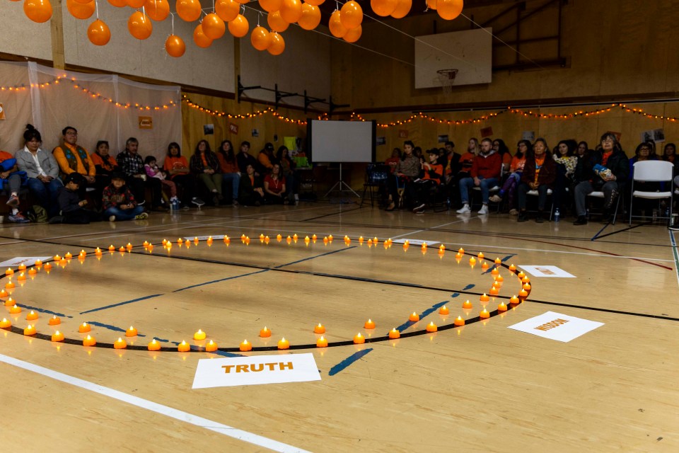 Lights in a circle mark people who did not survive the residential school system during a National Day for Truth and Reconciliation Ceremony in 2023.