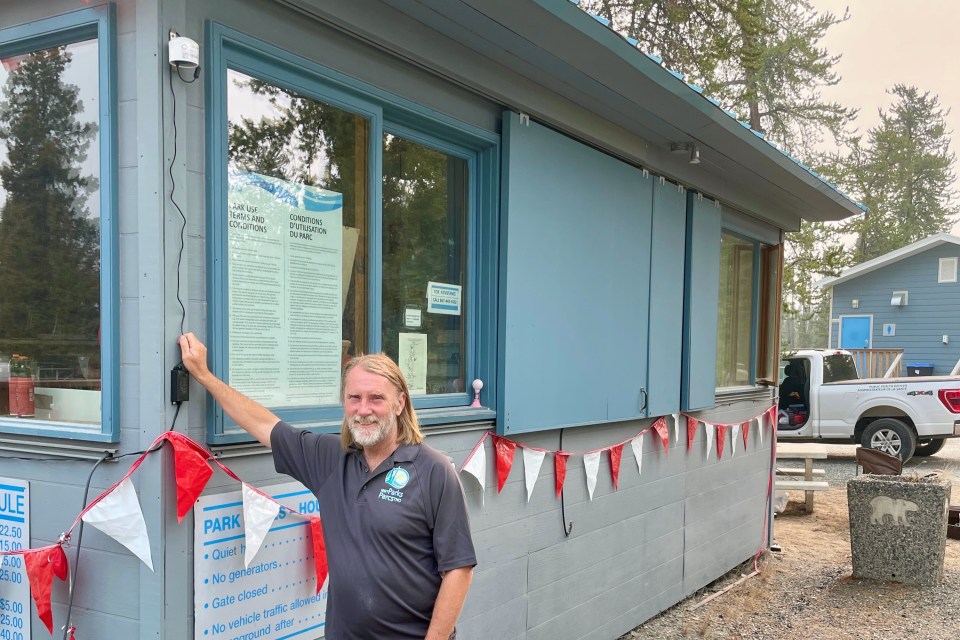 Bruce Davidson with a PurpleAir sensor at Prelude Lake Territorial Park. Colin Merz/GNWT