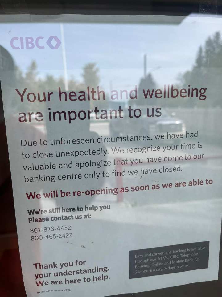 A notice on the door of CIBC states the branch is closed. Photo: Sean Whelly