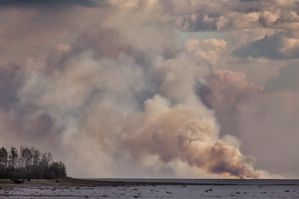 A wildfire near Hay River is seen from Fort Providence on September 2, 2023. Photo: Thorsten Gohl