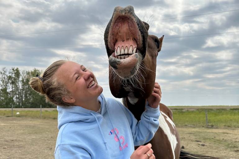 Megan Miskiman and a horse. Megan Miskiman/Cabin Radio