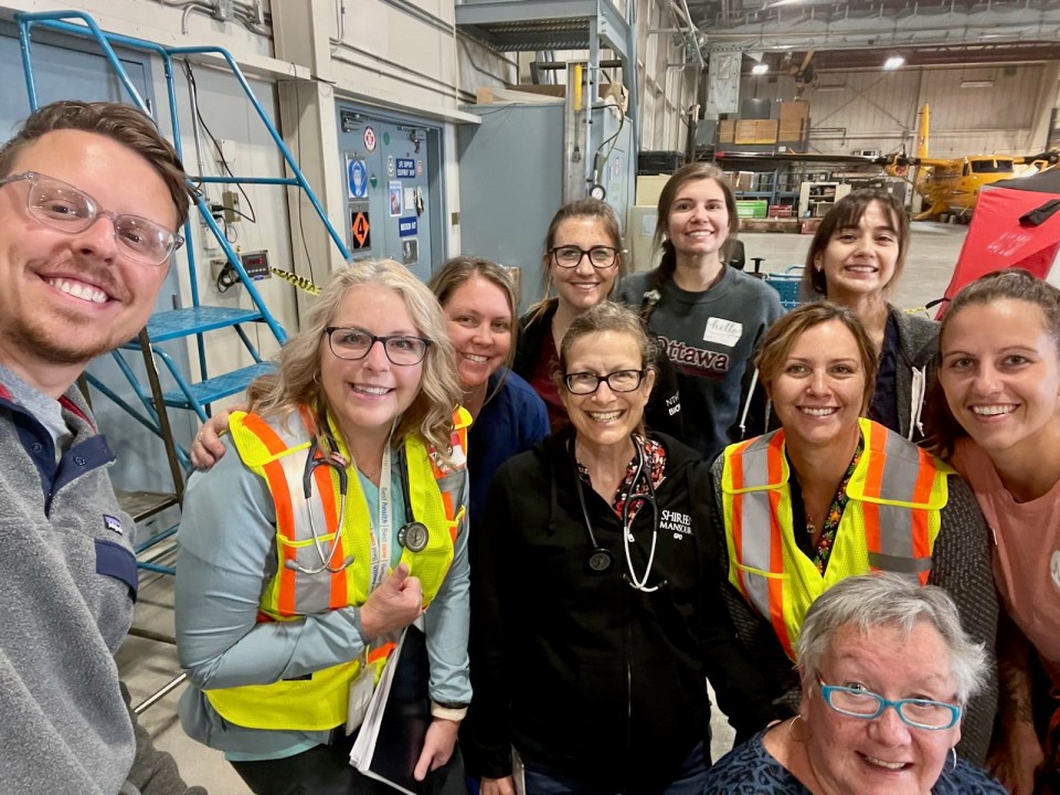 Staff who set up the field hospital in a hangar at Yellowknife Airport. Photo: NTHSSA