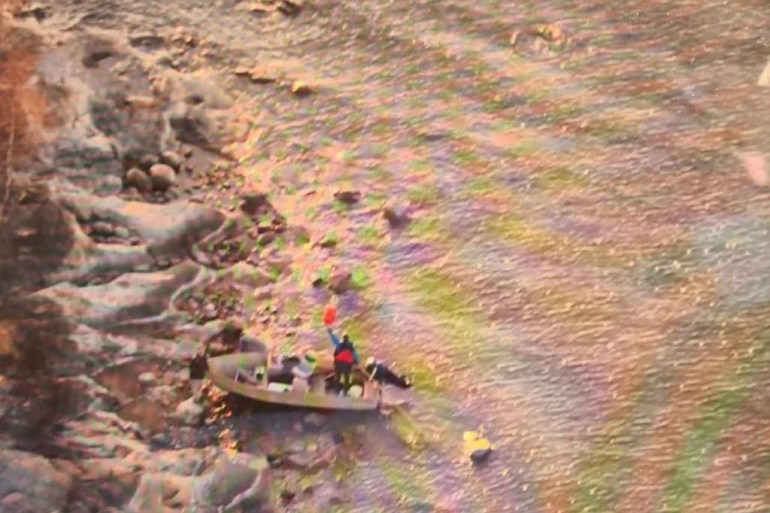 An image from a search aircraft shows Mark Elson and Samuel Roberts as they were located on October 14, 2023. Photo: Supplied