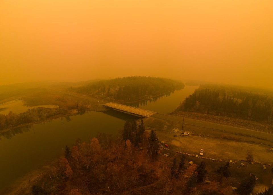 Smoke over the Yellowknife River bridge on September 23, 2023. Photo: Lucas Moore