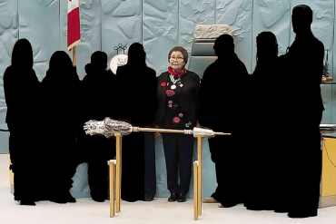 No wonder Commissioner Margaret Thom looks apprehensive. A lot of names want to fill these silhouettes. (Guess where RJ Simpson was standing in this photo).