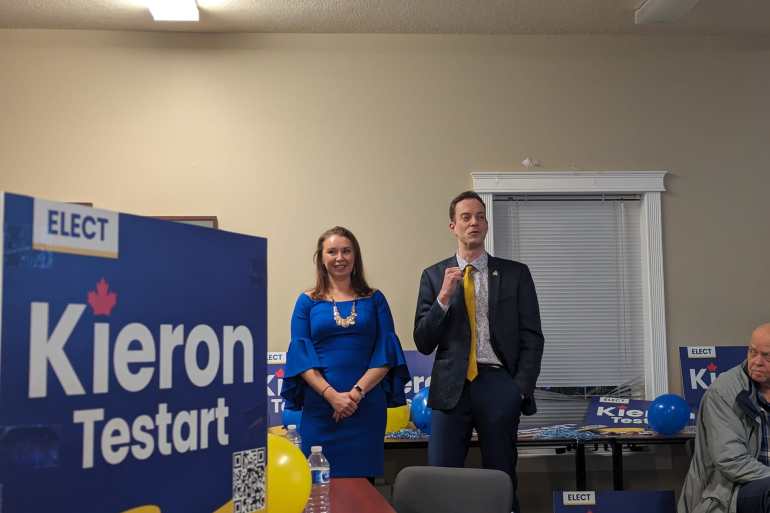 Kieron Testart and his supporters await Tuesday's results at his campaign headquarters. Samantha Stuart for Cabin Radio