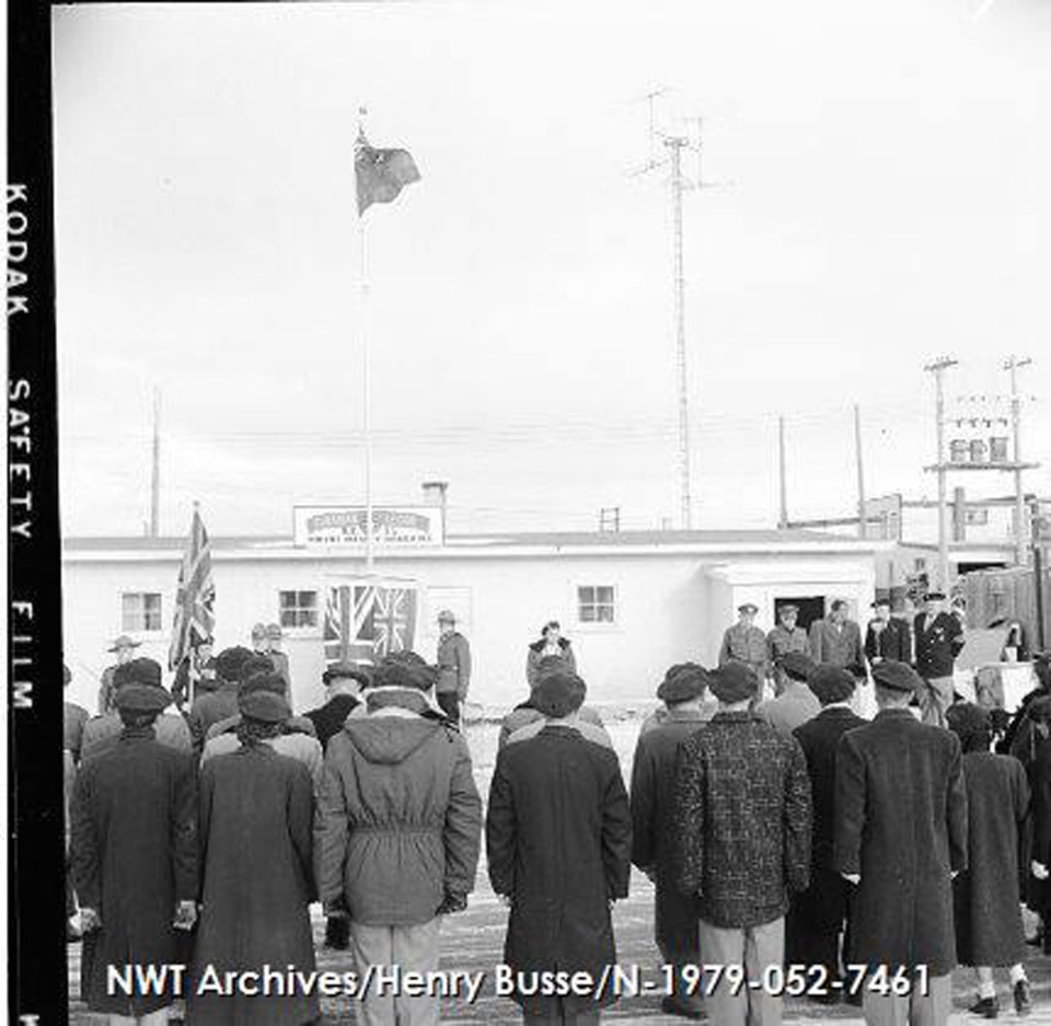 In October 1957, a memorial was unveiled in front of the Vincent Massey Canadian Legion building in Yellowknife. NWT Archives/Henry Busse fonds/N-1979-052: 7461