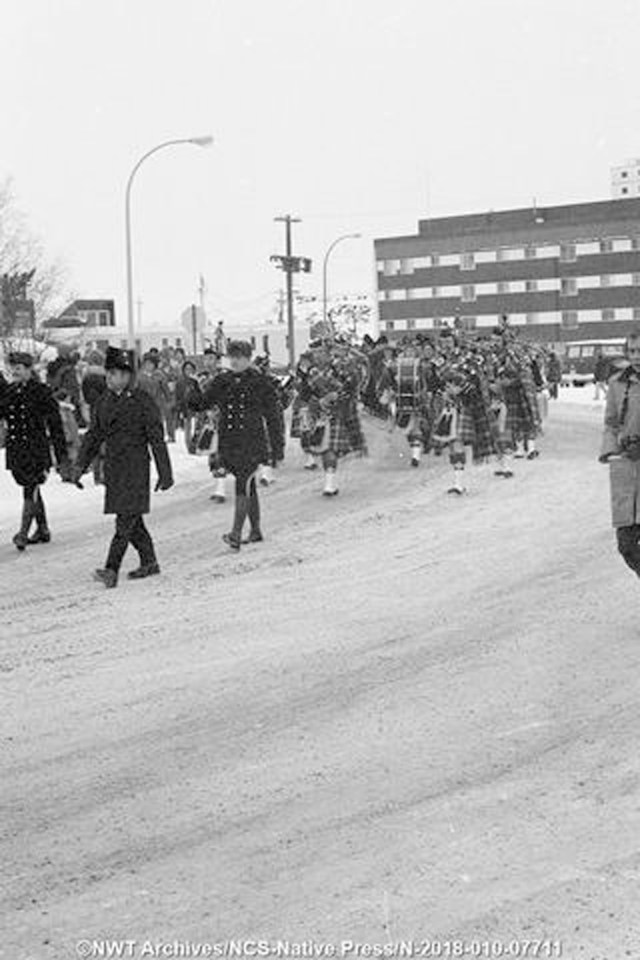 Bagpipers at a Remembrance Day parade in 1980. Harold Barnaby/NWT Archives/Native Communications Society fonds - Native Press photograph collection/N-2018-010: 07711