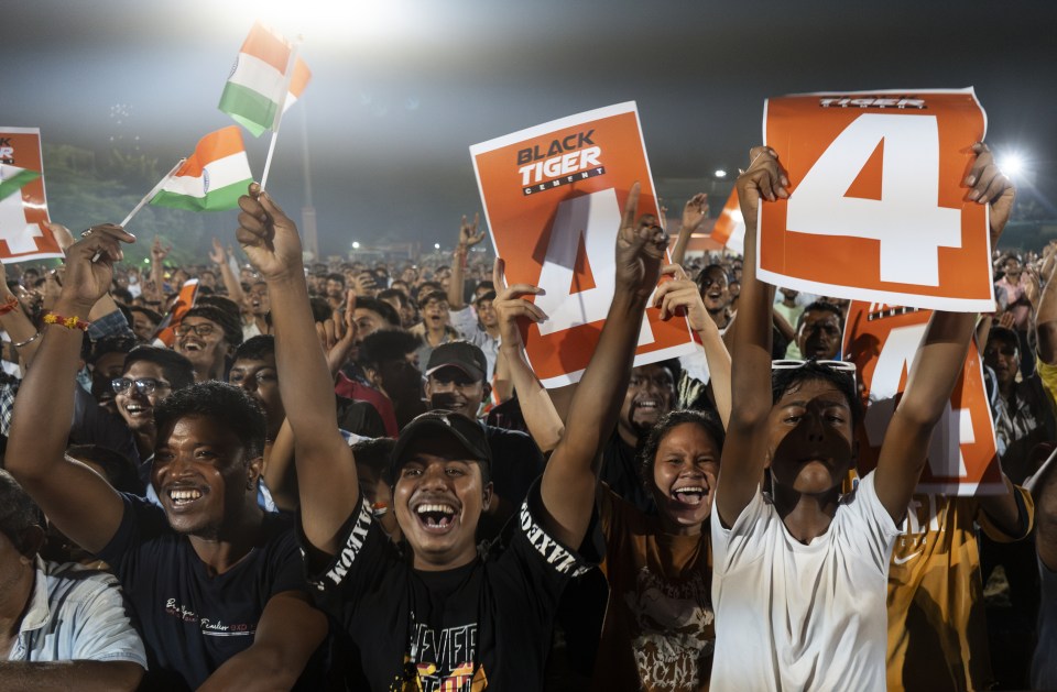 Indian fans watching the 2023 World Cup on a big screen in Guwahati, India. Talukdardavid/Dreamstime
