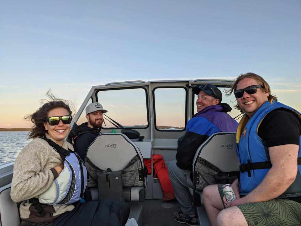 Greg, second from right, on his prized boat The Freelancer with what he called "the squad." Photo: Submitted