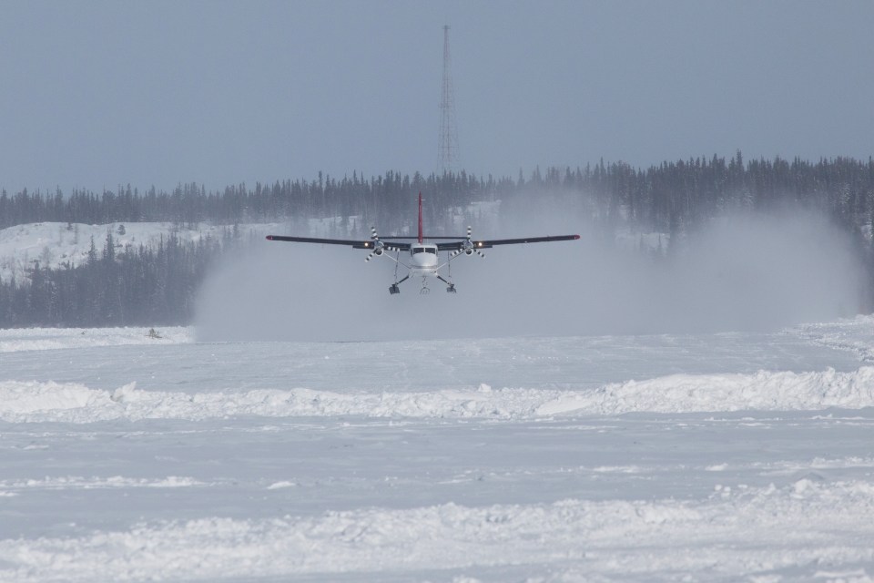 A file image of an Air Tindi Twin Otter with skis. Photo: Bill Braden