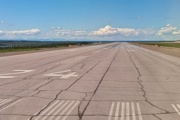 Inuvik Airport's runway in June 2023. Ollie Williams/Cabin Radio