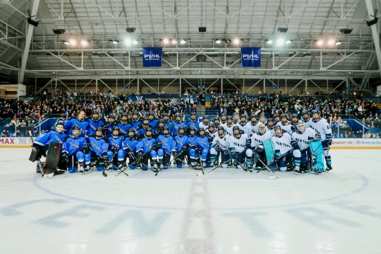 Toronto and New York players before their league-opening encounter in a photo published by the PWHL.