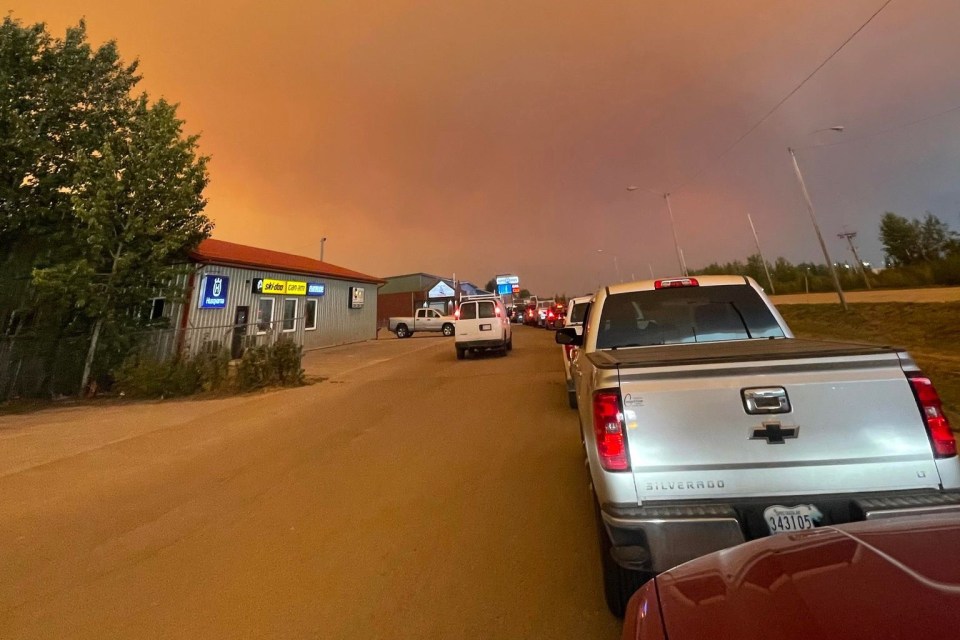 Residents evacuate Hay River on August 13, 2023. Photo: Gina Anne Mercredi