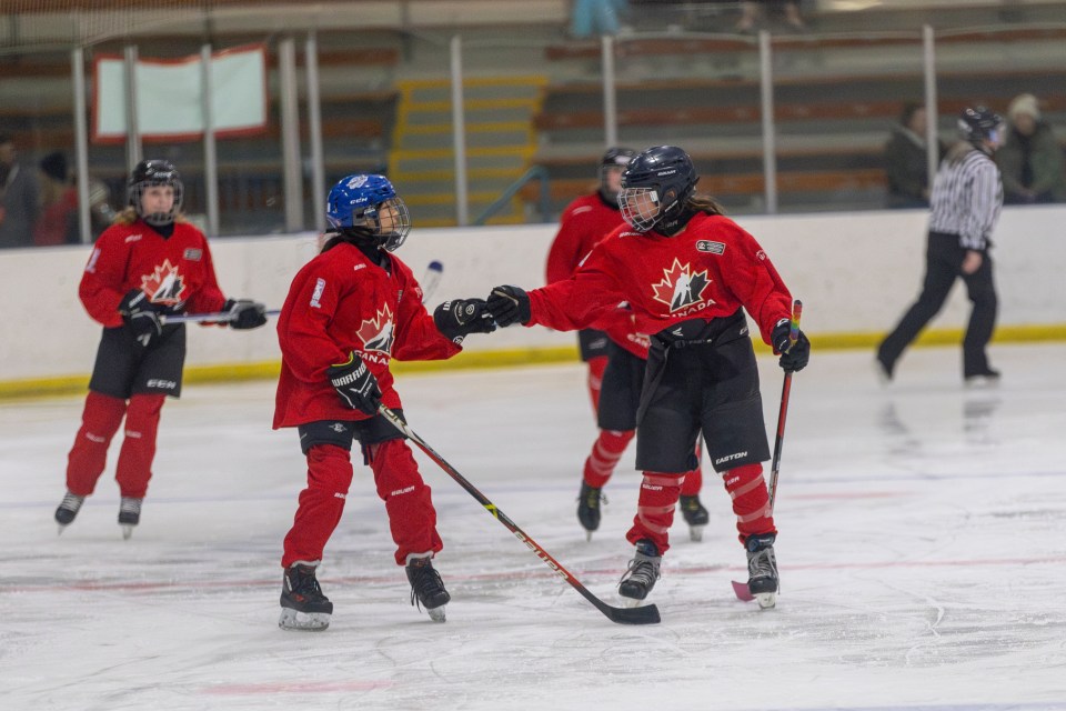 Players celebrate a goal during a "global game" at the One for All weekend. Ollie Williams/Cabin Radio