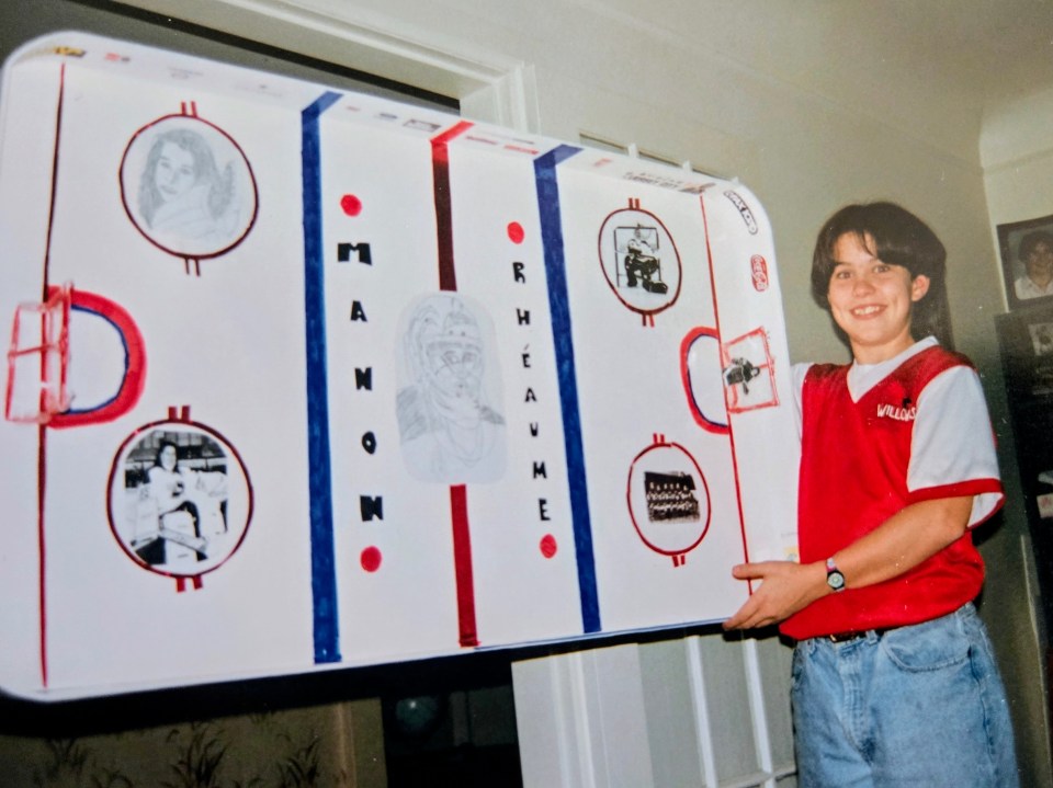 A young Ali Simpson with a school project on Canadian hockey legend Manon Rhéaume. Photo: Submitted