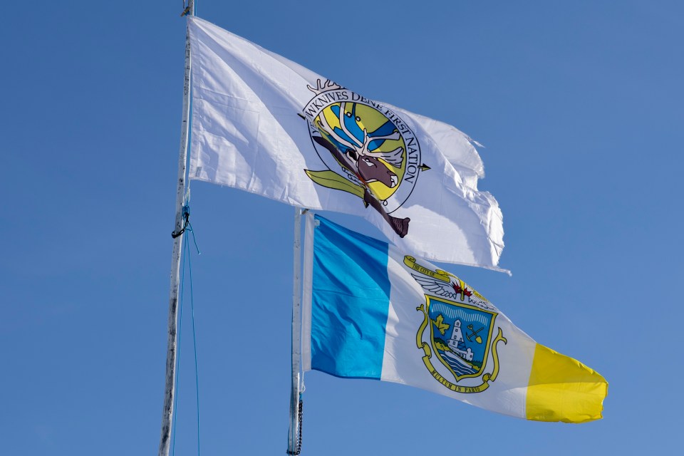 City of Yellowknife and Yellowknives Dene First Nation flags. Ollie Williams/Cabin Radio