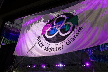 An Arctic Winter Games flag at the 2024 opening ceremony in Wasilla, Alaska. Ollie Williams/Team NT