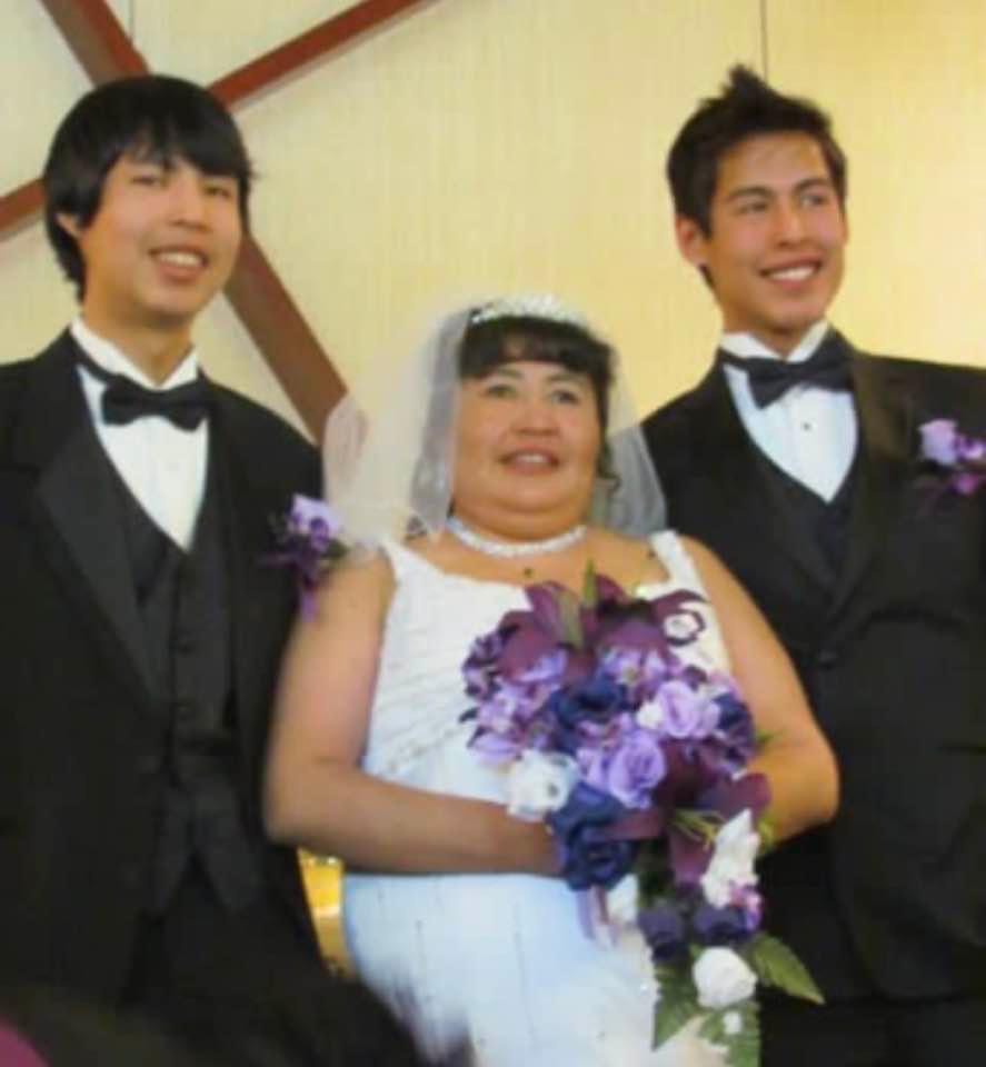 Steven and Frank Gruben with their mother at the wedding of Laura and Charlie Kalinek in 2012. Photo: Samantha Kerr