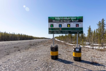 A wildfire danger level notice board along Highway 3. Ollie Williams/Cabin Radio