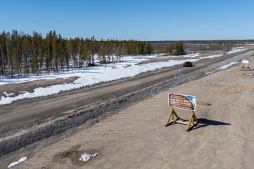 The entrance to the Tłı̨chǫ Highway, Highway 9 to Whatì. Ollie Williams/Cabin Radio